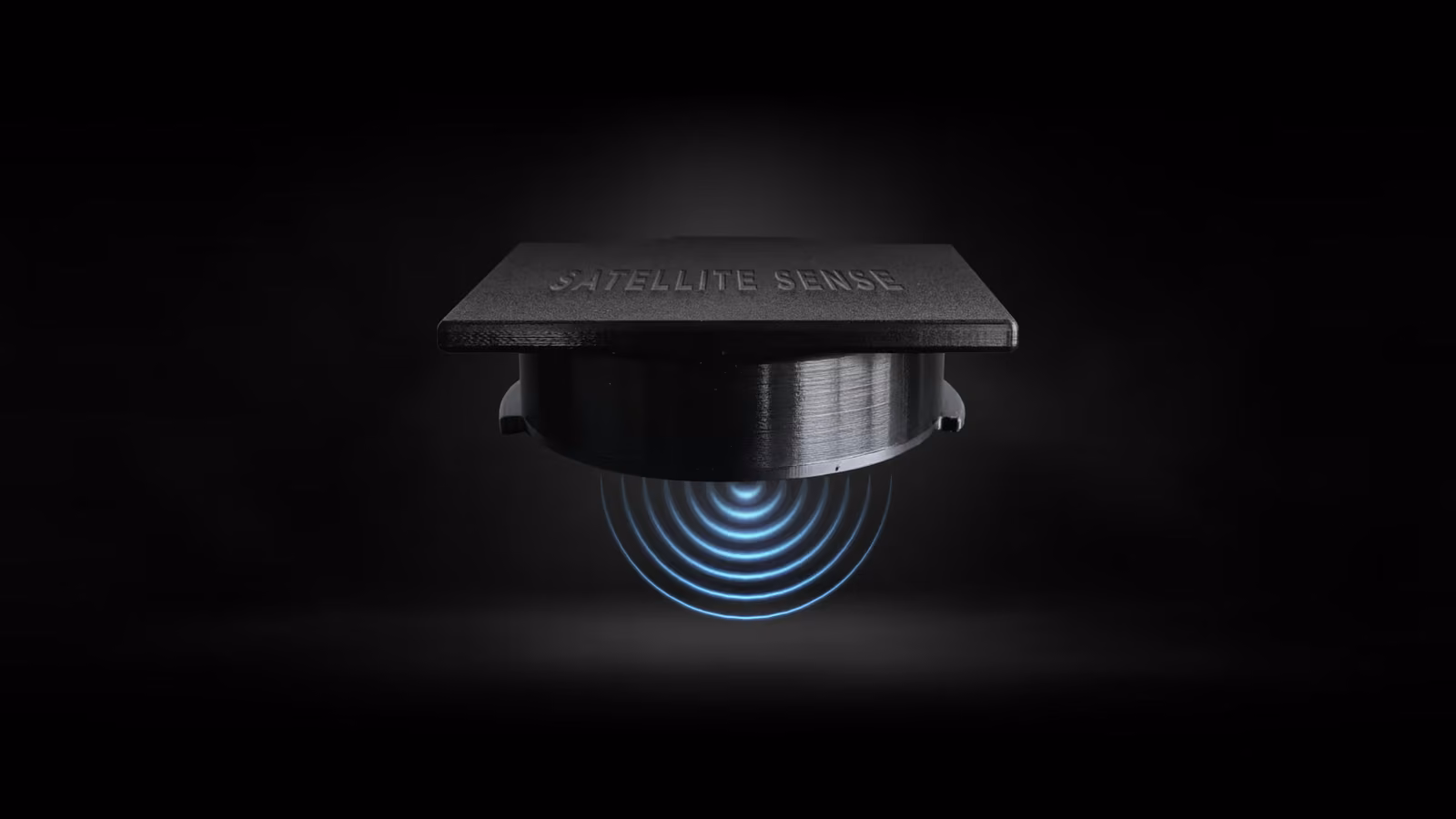 A sleek satellite sensor with concentric blue sound waves emanating from it, against a dark