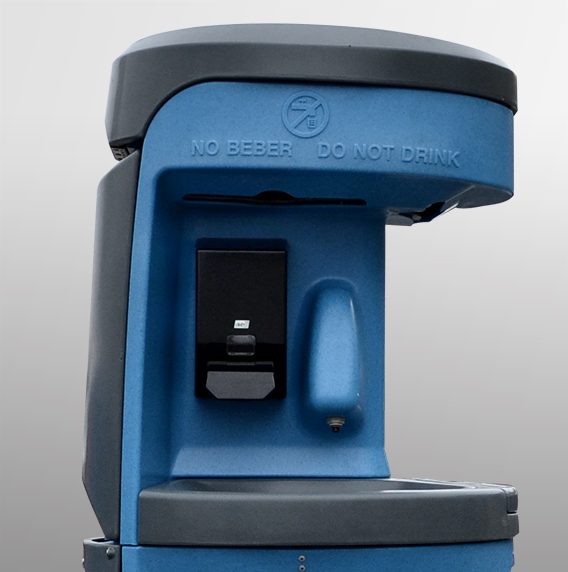 A blue water fountain with a gray top and a sign reading "NO BEBER DO NOT DRINK."