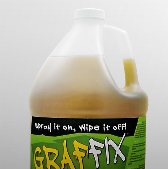 A gallon container of Grafix graffiti remover, labeled with bold text and a green logo.